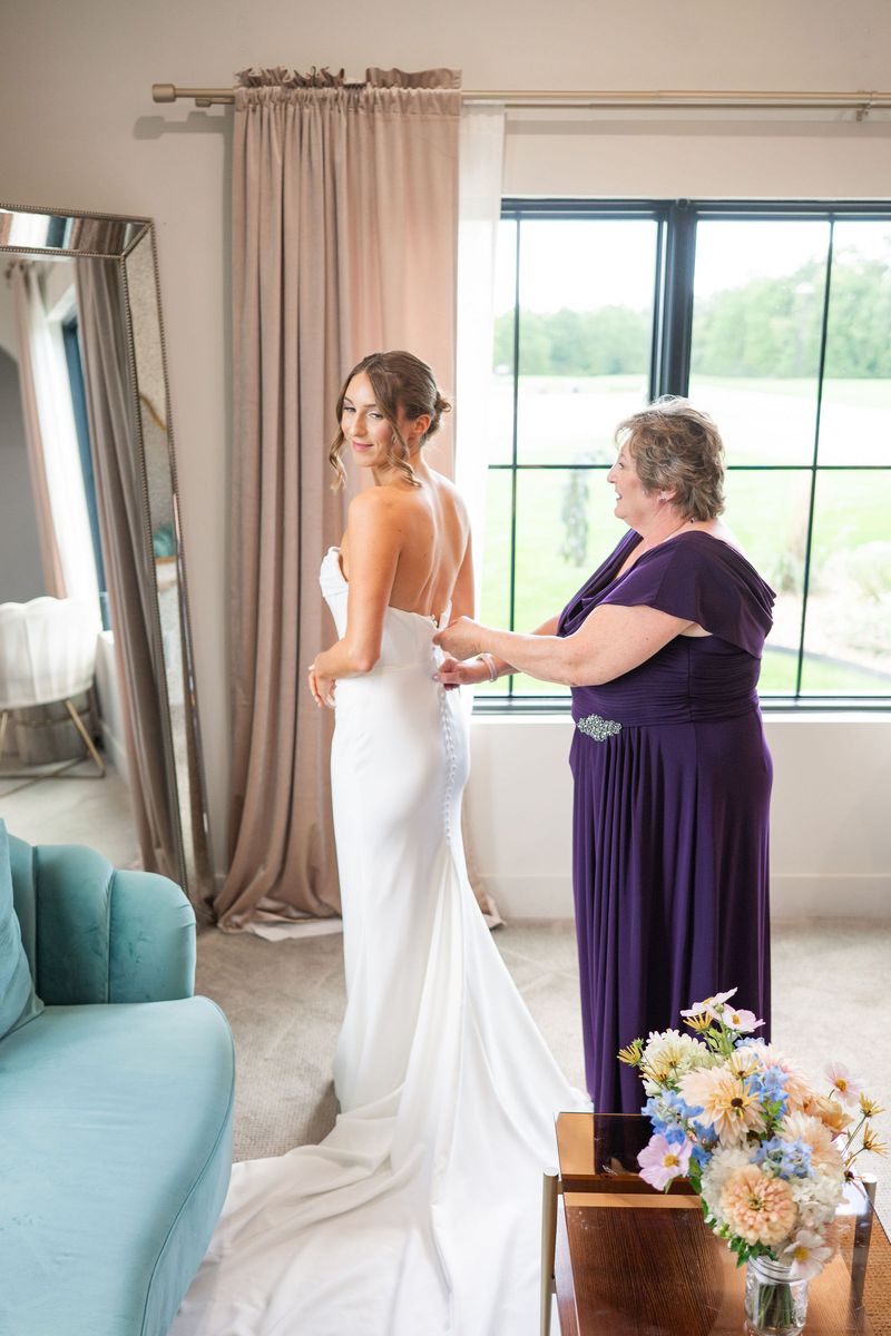 Katie and her mother with the dress