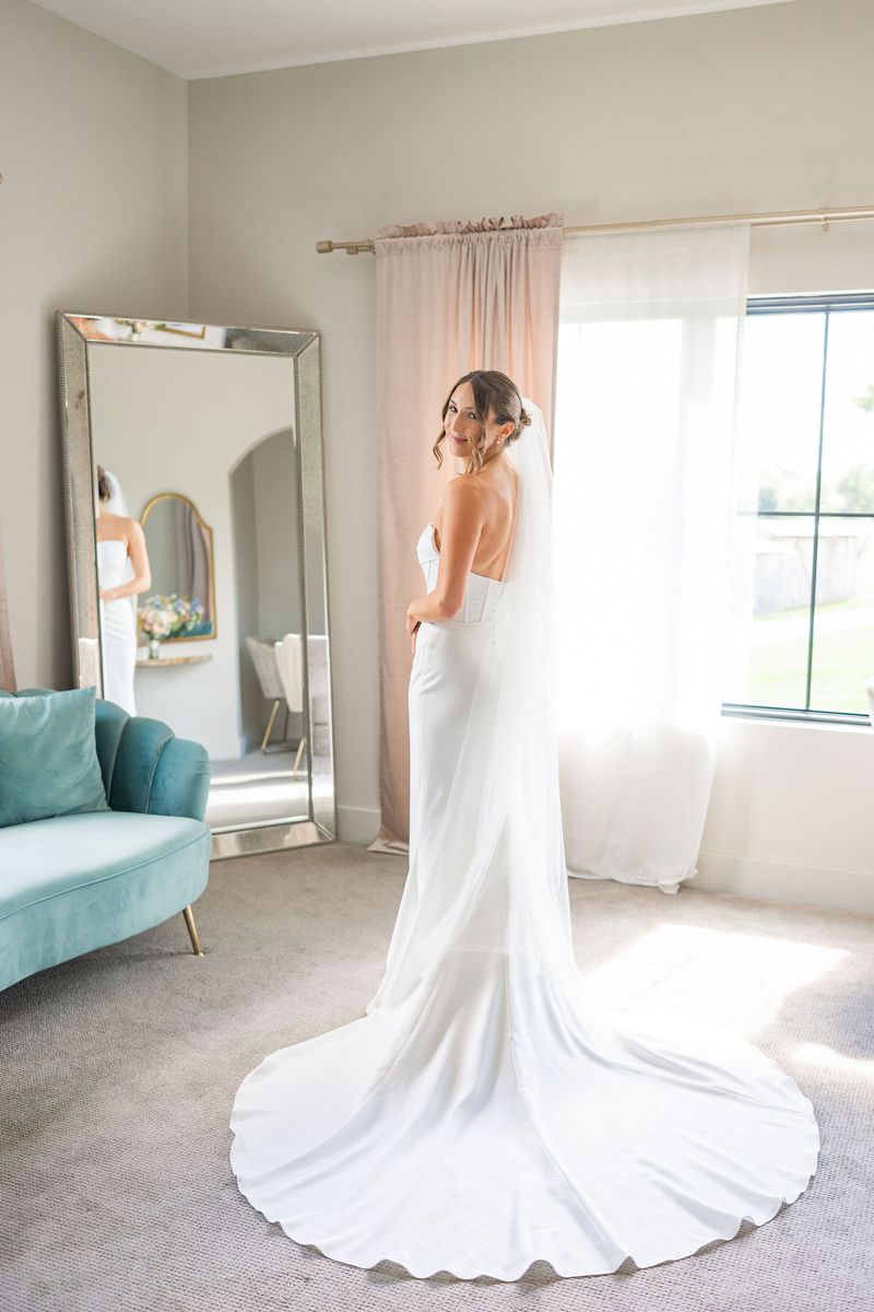 Katie's gown and train by the window