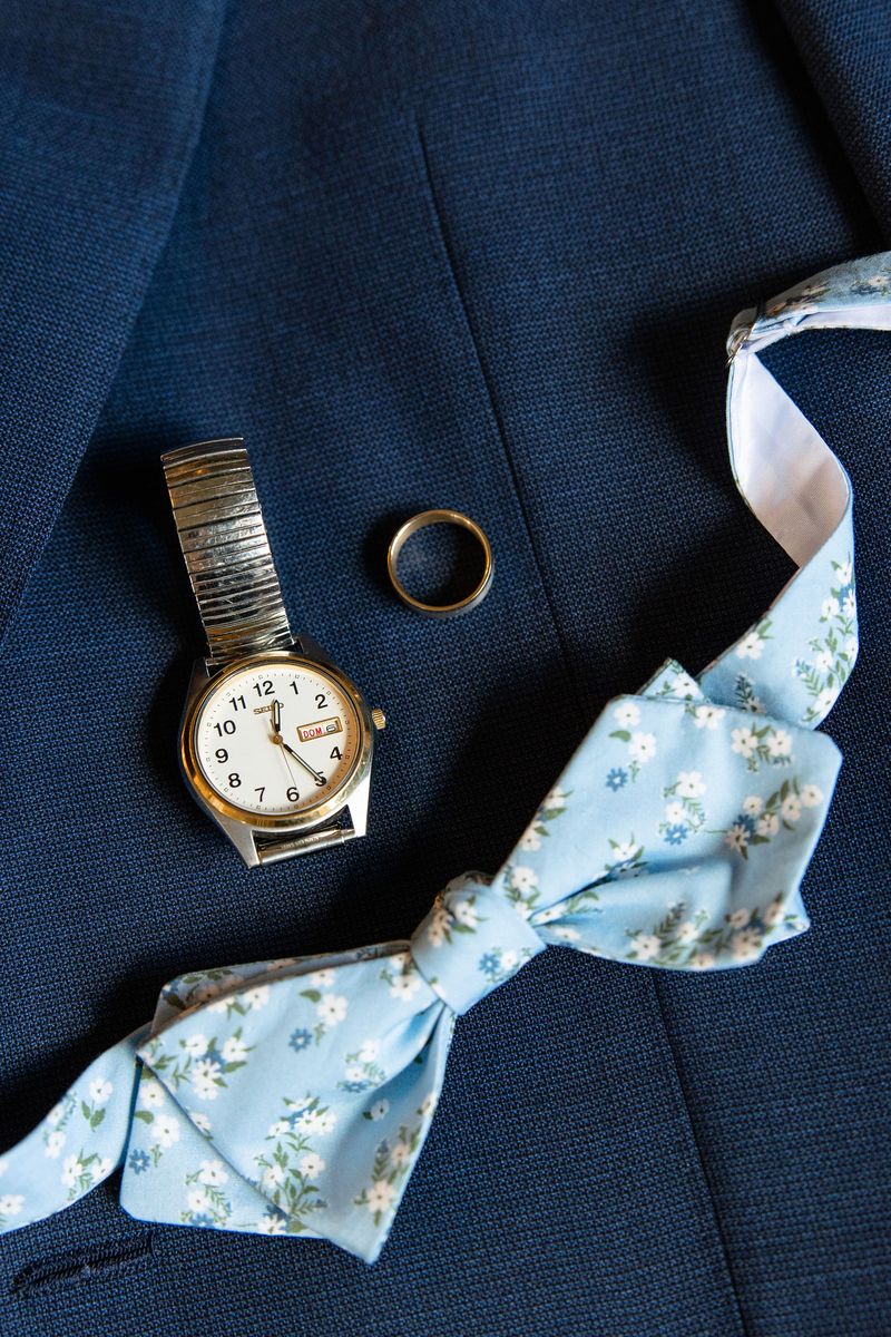 Dennis's watch and blue floral bow tie