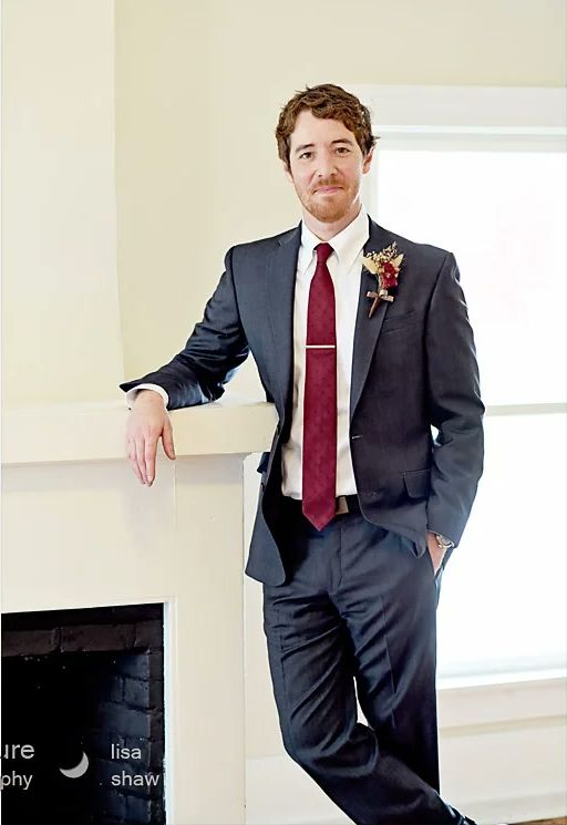 Brian in his navy suit and red tie