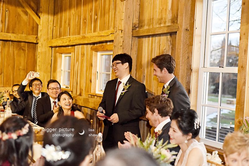 Guests laughing during the toasts