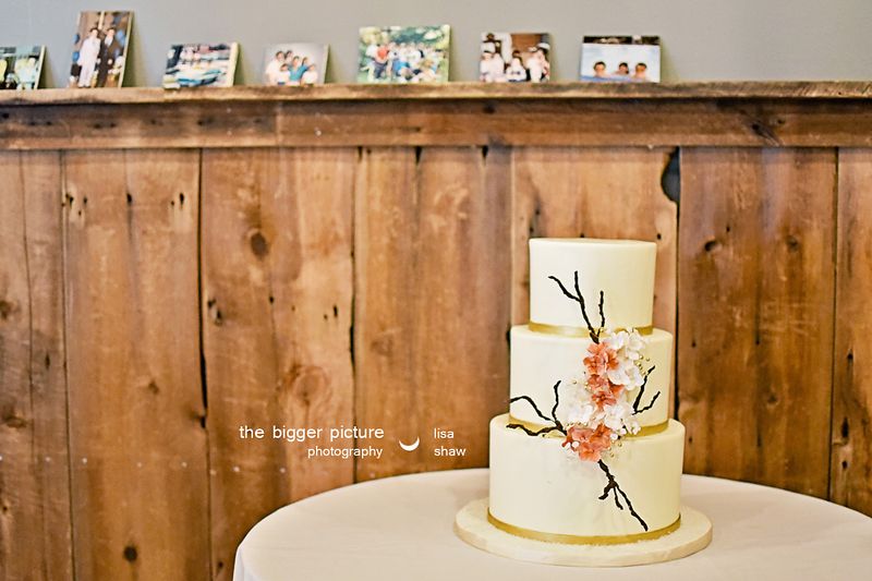 The wedding cake with painted cherry blossoms