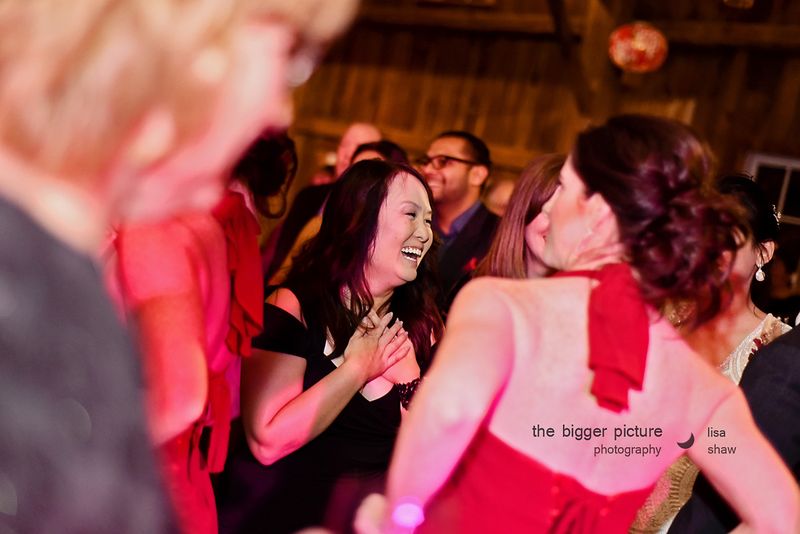 Guests dancing in the barn