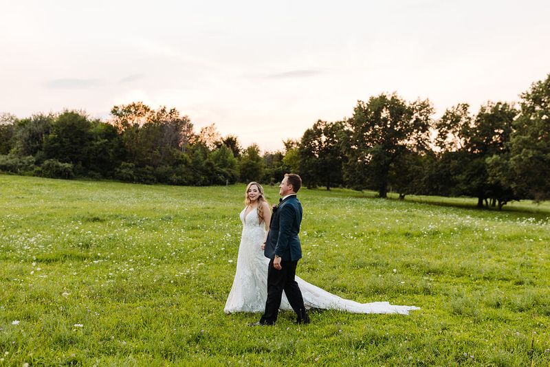 Genna and Frank in the field at golden hour