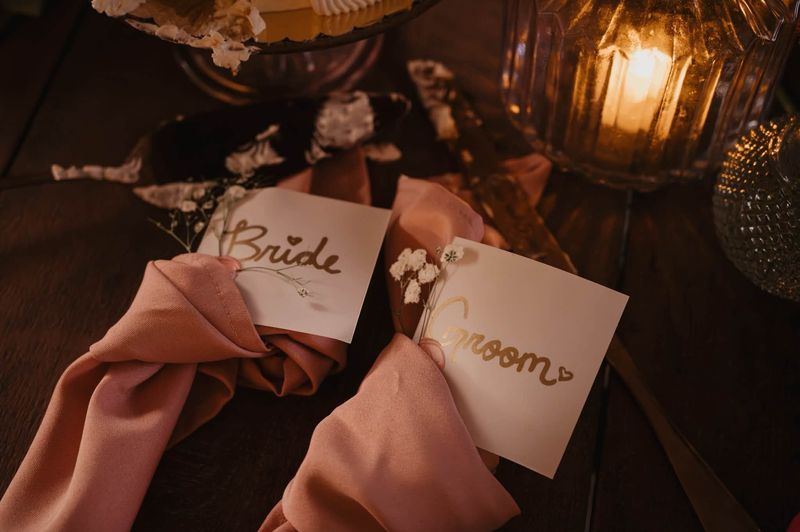 Place cards for the bride and groom
