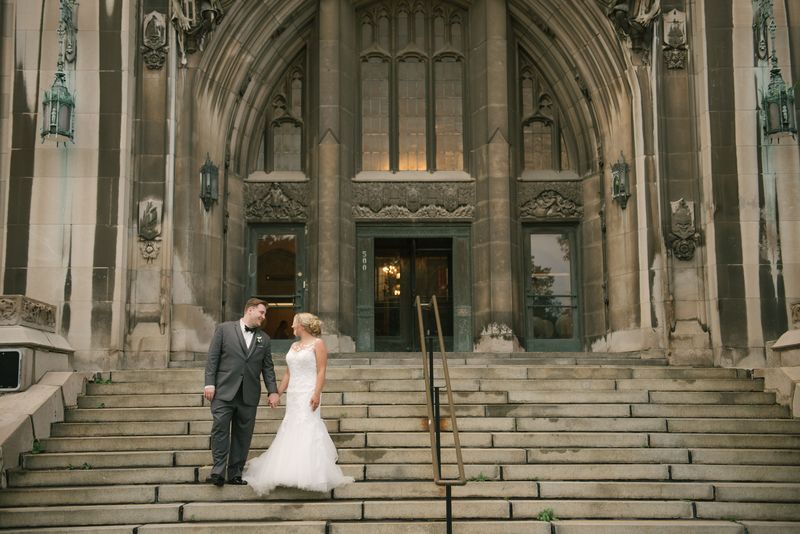 Patricia and Bryan on the stone steps of the Masonic Temple