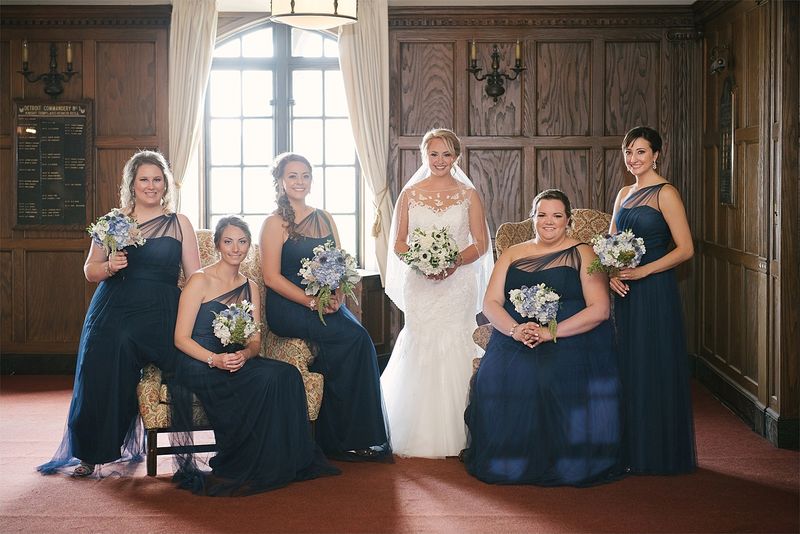 Patricia and her bridesmaids in a wood-panelled room