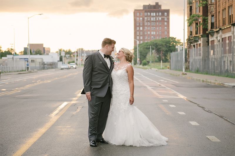 Patricia and Bryan in the street outside at golden hour