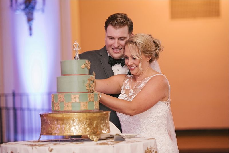 Patricia and Bryan cutting the cake