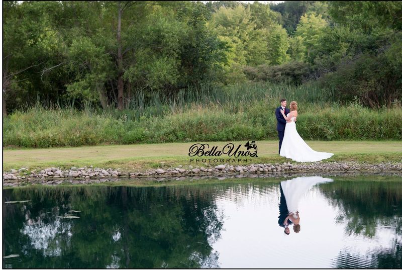 Tom and Ellen reflected in the pond